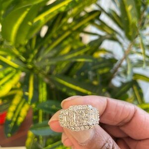 Selling this Beautiful and Blinged out 14 Carat white Gold ring.